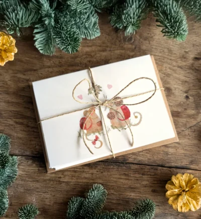 Christmas card pack bundle of two mice under mistletoe.